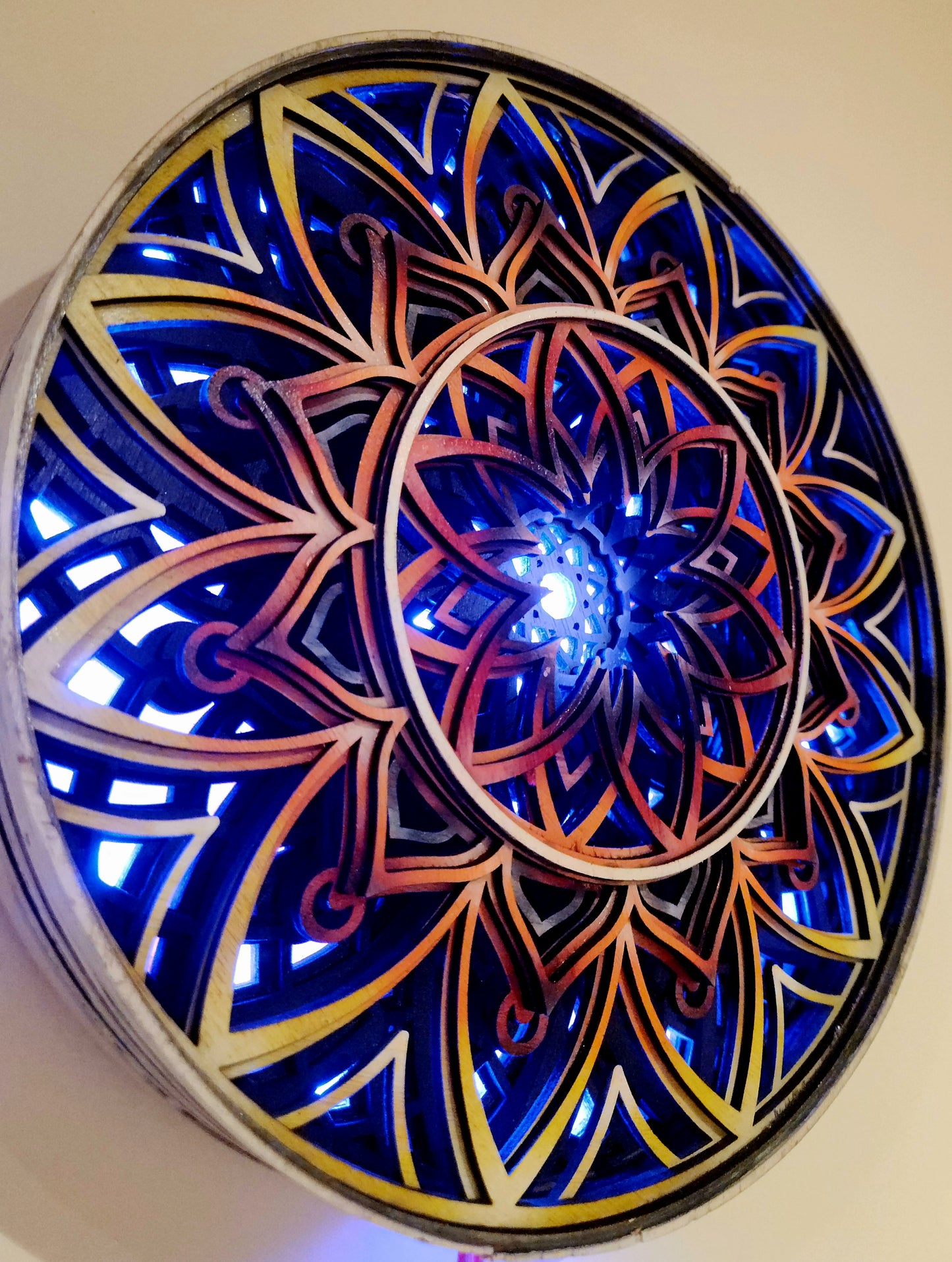 Illuminated Multilayer Laser-Cut Round Art Piece with Sound-Responsive Lighting